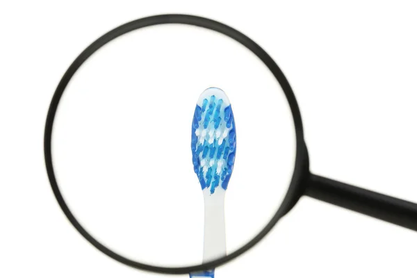 Toothbrush Magnifying Glass White Background — Stock Photo, Image