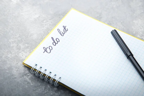 Κάνουμε Λίστα Στο Σημειωματάριο Notepad Αισθητή Πένα Tip Γκρίζο Φόντο — Φωτογραφία Αρχείου