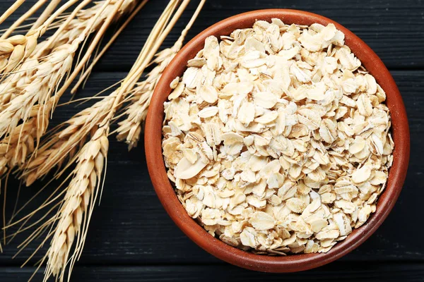 Avena Cruda Tazón Sobre Mesa Madera Negra — Foto de Stock