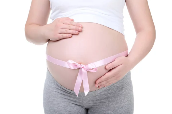 Zwangere Vrouw Met Een Roze Lint Witte Achtergrond — Stockfoto