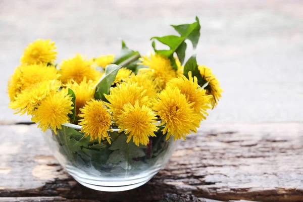 Yellow Dandelions Bowl Wooden Table — Stock Photo, Image