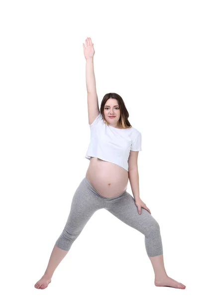 Unga Gravid Kvinna Gör Övningar Vit Bakgrund — Stockfoto