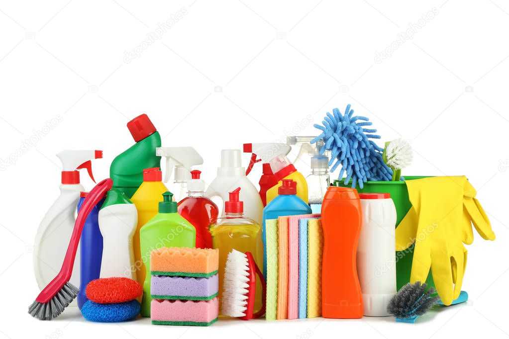 Bottles with detergent and cleaning tools on white background