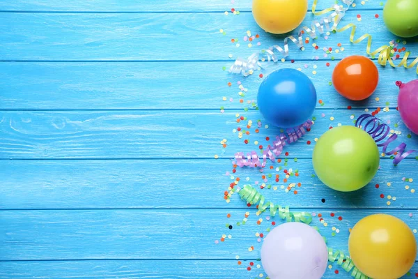 Colorful Balloons Confetti Blue Wooden Background — Stock Photo, Image