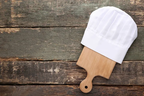 Chef Hat Chopping Board Grey Wooden Table — Stock Photo, Image