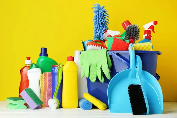 Bottles Detergent Cleaning Tools Yellow Background — Stock Photo, Image