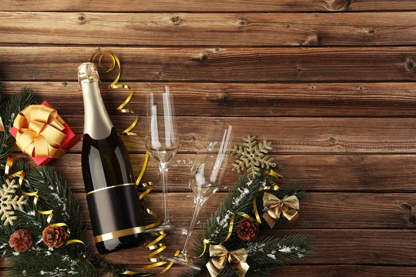 Champagne Bottle Glasses Fir Tree Branches Brown Wooden Table — Stock Photo, Image