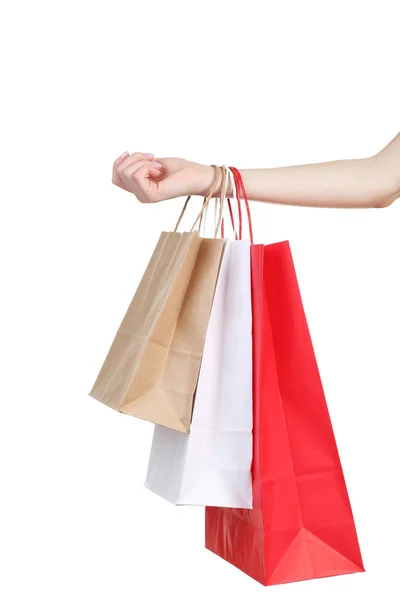 白地カラフルなショッピング バッグを持っている女性の手 — ストック写真