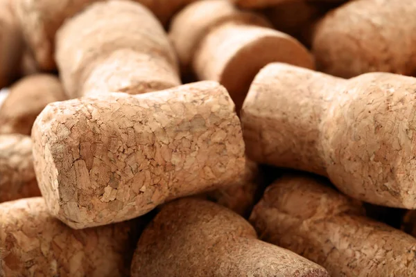 close-up of brown champagne corks in heap