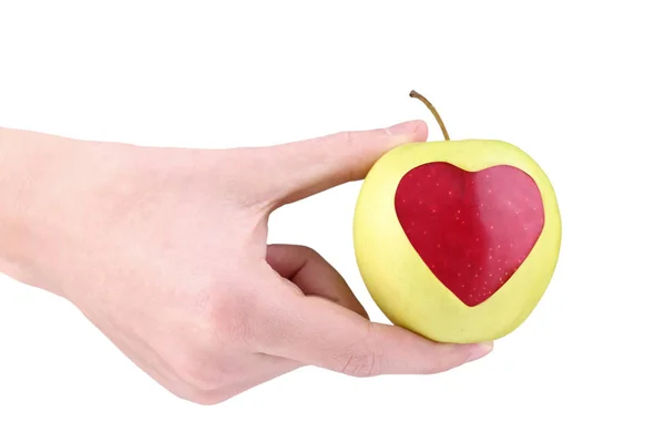 Weibliche Hand Hält Apfel Mit Ausschnitt Herzform Auf Weißem Hintergrund — Stockfoto