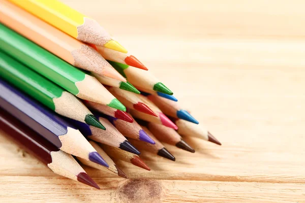 Colored Pencils Heap Brown Wooden Surface — Stock Photo, Image