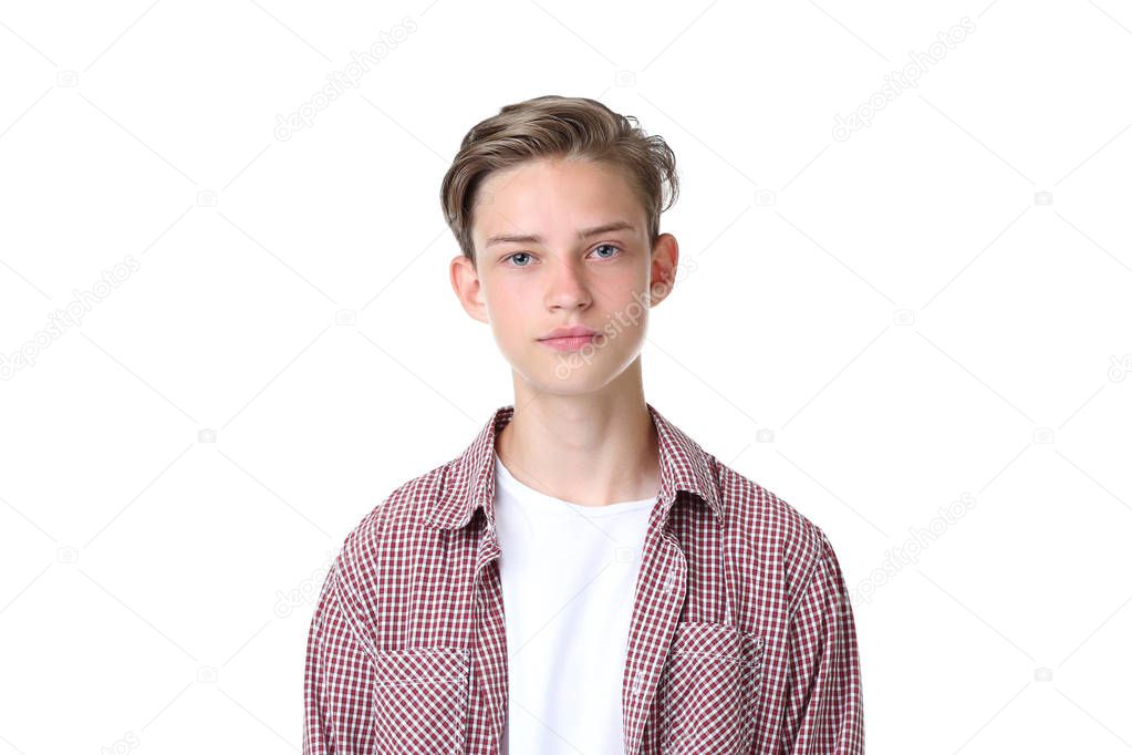 Cute teenager standing on white background