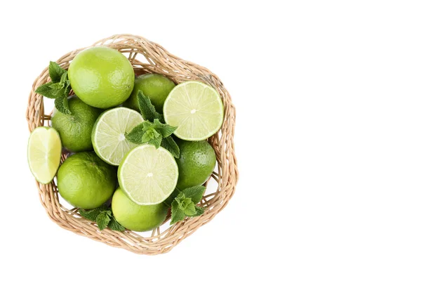 Ripe Limes Basket Isolated White Background — Stock Photo, Image