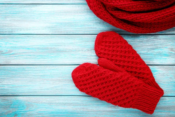 Knitted Red Gloves Blue Wooden Table — Stock Photo, Image