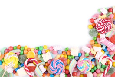 Tatlı şeker ve beyaz arka plan üzerinde lolipop