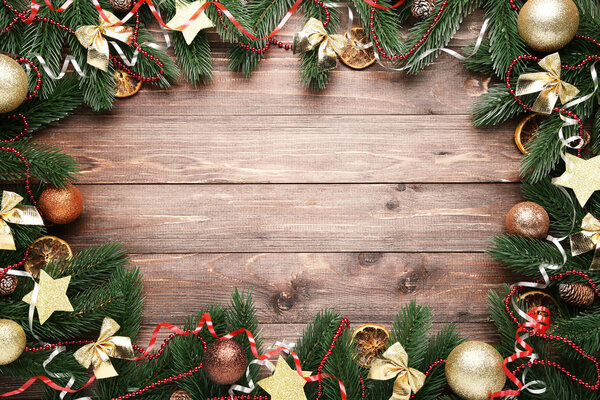 Colorful christmas decorations on brown wooden table