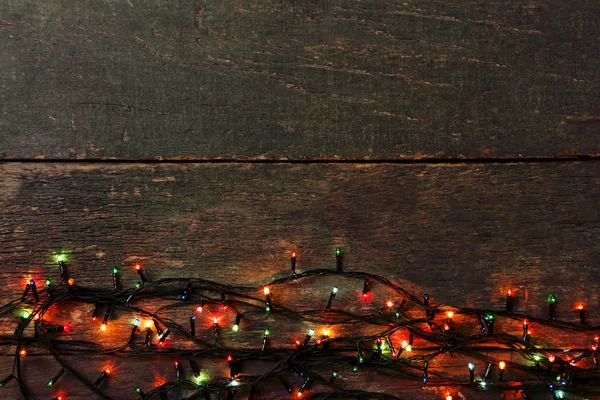 Christmas Garland Lights Grey Wooden Table — Stock Photo, Image