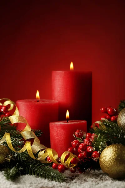 Christmas Candle Fir Tree Branches Baubles Red Background — Stock Photo, Image