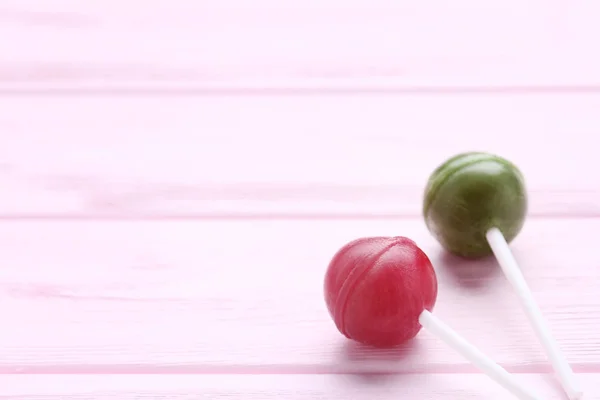 Sweet Lollipops Pink Wooden Table — Stock Photo, Image