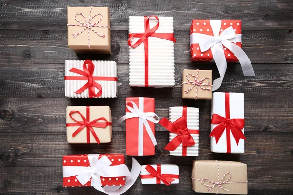 Colorful christmas gift boxes with on wooden table