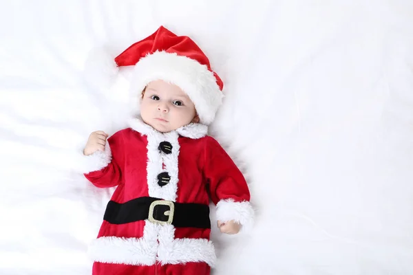 Menino Traje Natal Deitado Cama — Fotografia de Stock