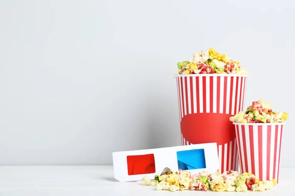 Sweet Popcorn Striped Buckets Glasses Grey Background — Stock Photo, Image