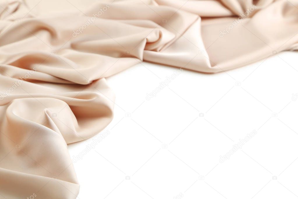 Beige satin cloth on white background