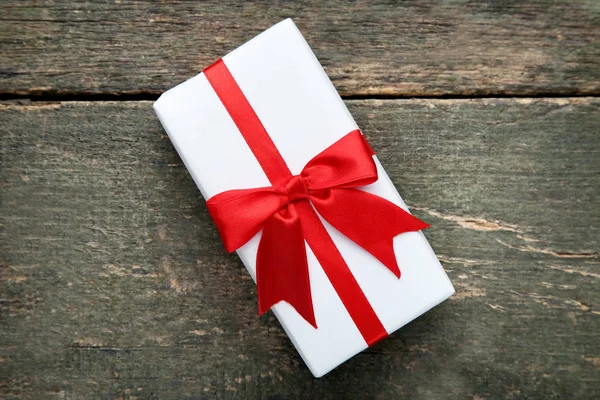 Gift Box Red Ribbon Wooden Table — Stock Photo, Image