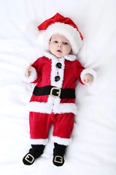 Menino Traje Natal Deitado Cama — Fotografia de Stock