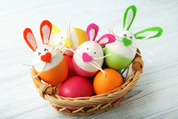 Eggs Funny Rabbit Faces Basket Wooden Table — Stock Photo, Image