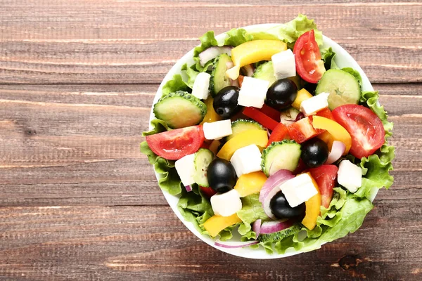 Groente Salade Kom Bruin Houten Tafel — Stockfoto