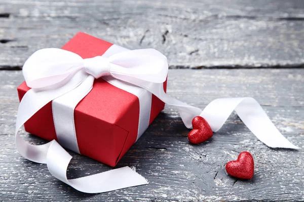 Gift Box Ribbon Bow Hearts Grey Wooden Table — Stock Photo, Image