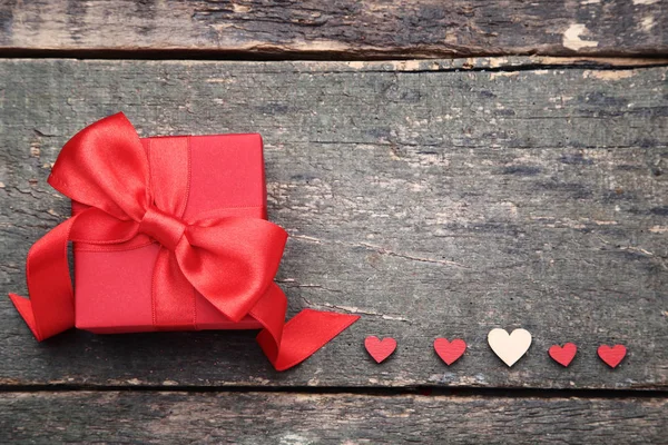 Gift Box Ribbon Bow Small Hearts Grey Wooden Table — Stock Photo, Image