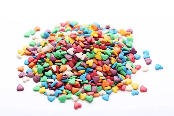 Sprinkles Beyaz Arka Plan Üzerinde Renkli Kalp Şeklinde — Stok fotoğraf