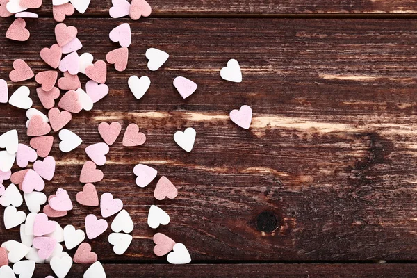 Heart Shaped Sprinkles Brown Wooden Table — Stock Photo, Image