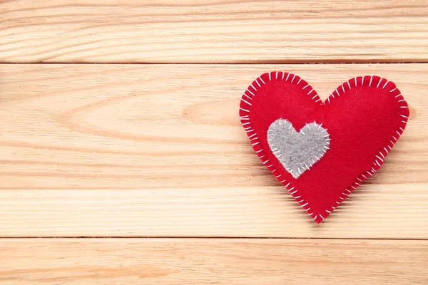 Red Fabric Heart Brown Wooden Table — Stock Photo, Image