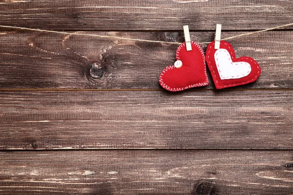 Fabric Hearts Hanging Brown Wooden Background — Stock Photo, Image