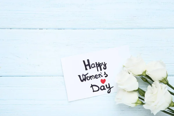 Text Fröhlicher Frauentag Mit Eustoma Blumen Auf Holztisch — Stockfoto