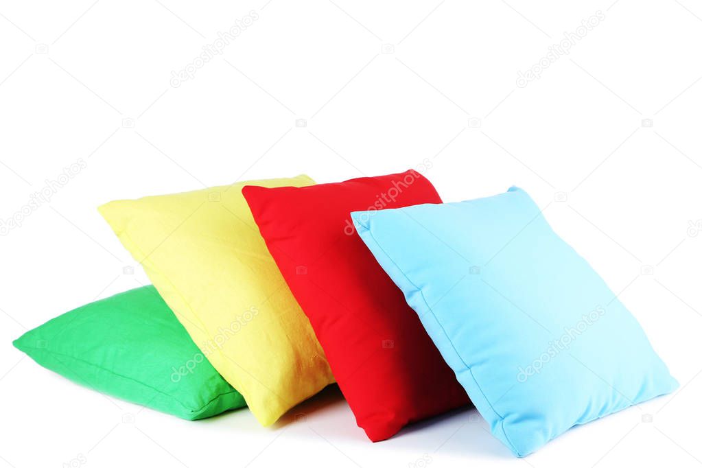 Soft colorful pillows isolated on white background