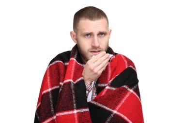 Duygu hasta beyaz zemin üzerine sıcak ekose ile genç adam