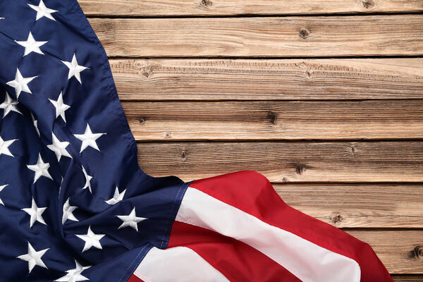 American flag on brown wooden table