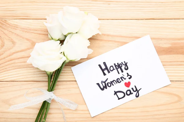 Texto Feliz Día Mujer Con Flores Eustoma Mesa Madera Marrón —  Fotos de Stock