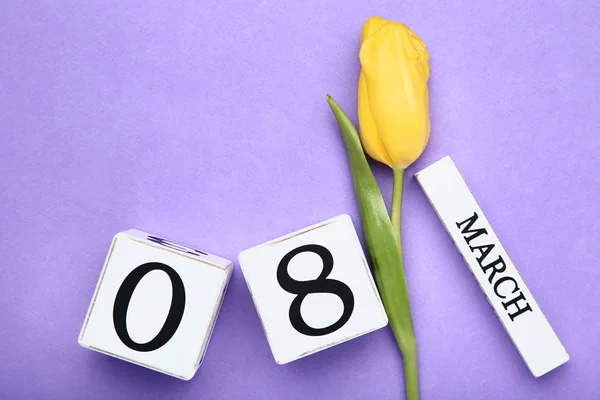 Women Day Wooden Calendar Yellow Tulip Purple Background — Stock Photo, Image