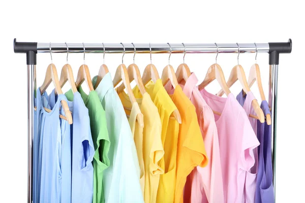 Fashion clothes hanging on wooden hanger — Stock Photo, Image