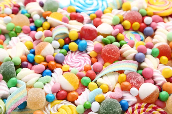 Arka plan tatlı şekerler ve lolipop — Stok fotoğraf