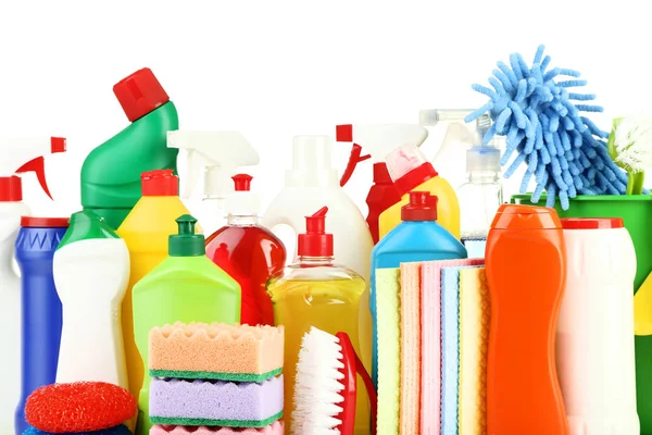 Bottles with detergent and cleaning tools on white background — Stock Photo, Image