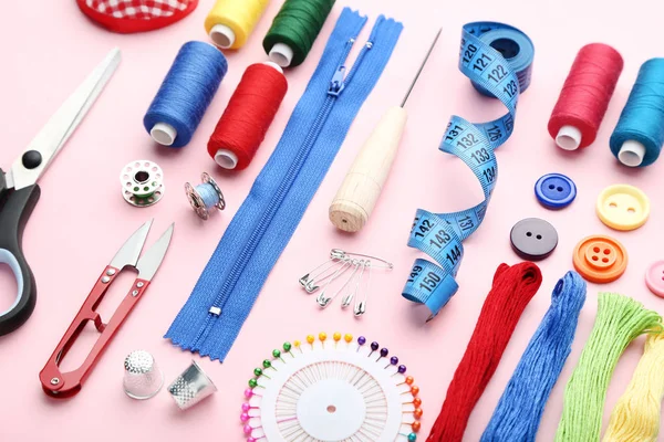 Sewing accessories on pink background — Stock Photo, Image