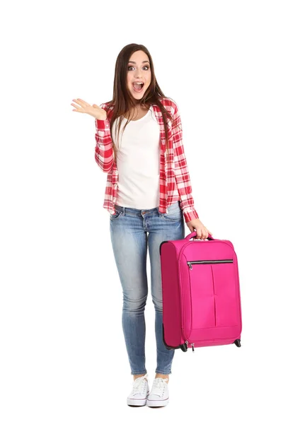 Молода дівчина з валізою ізольована на білому тлі — стокове фото