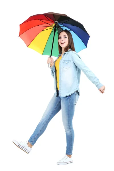 Young girl with colorful umbrella isolated on white background — Stock Photo, Image