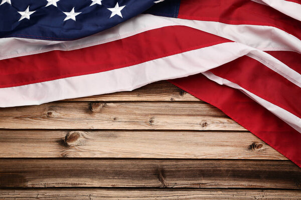 American flag on brown wooden table
